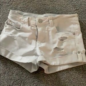 bebe white ripped shorts